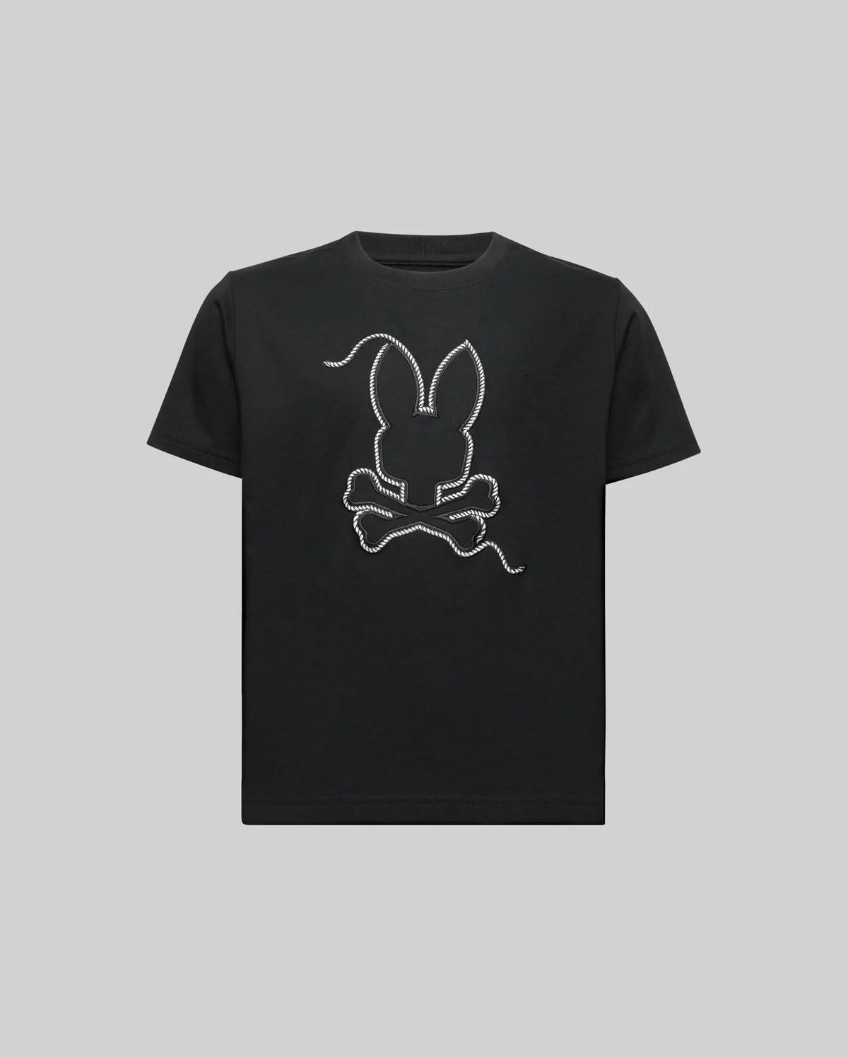 The KIDS CYRUS GRAPHIC TEE (KT0200047) by Psycho Bunny features a white outlined bunny head with long ears above crossed bones, centered on the chest. Made from ultra-soft Pima cotton, it comes in gray and channels a sailor’s spirit.