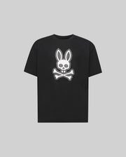 The Psycho Bunny KIDS RYDER OVERSIZED FIT TEE (KT0200056) is a black premium tee crafted from soft Pima cotton, featuring a white embroidered Bunny skull with bunny ears above crossed bones against a gray background.