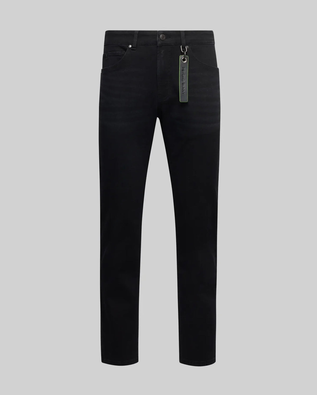 Black Mens Emerson Denim Pant, slim fit, classic five-pocket style, with a neon green Psycho Bunny branded tag on the belt loop, showcasing premium denim texture.