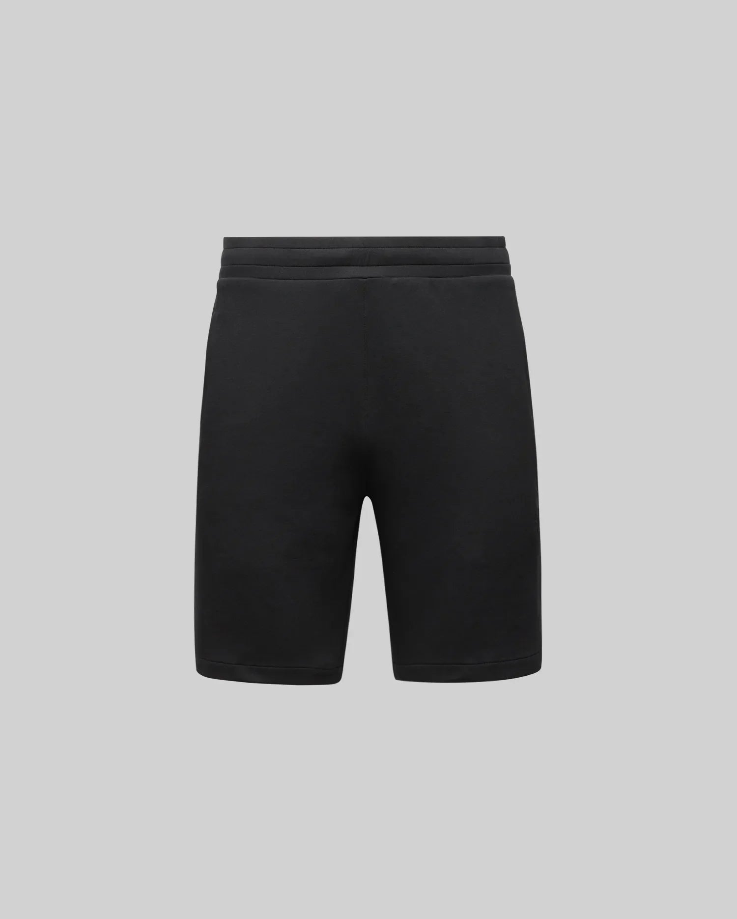 The Psycho Bunny MENS LAZSLO SWEATSHORT - MB0900016 is shown front-facing in plain black against a light gray background, featuring a simple elastic waistband and crafted from stretch modal-cotton-blend jersey for comfort.