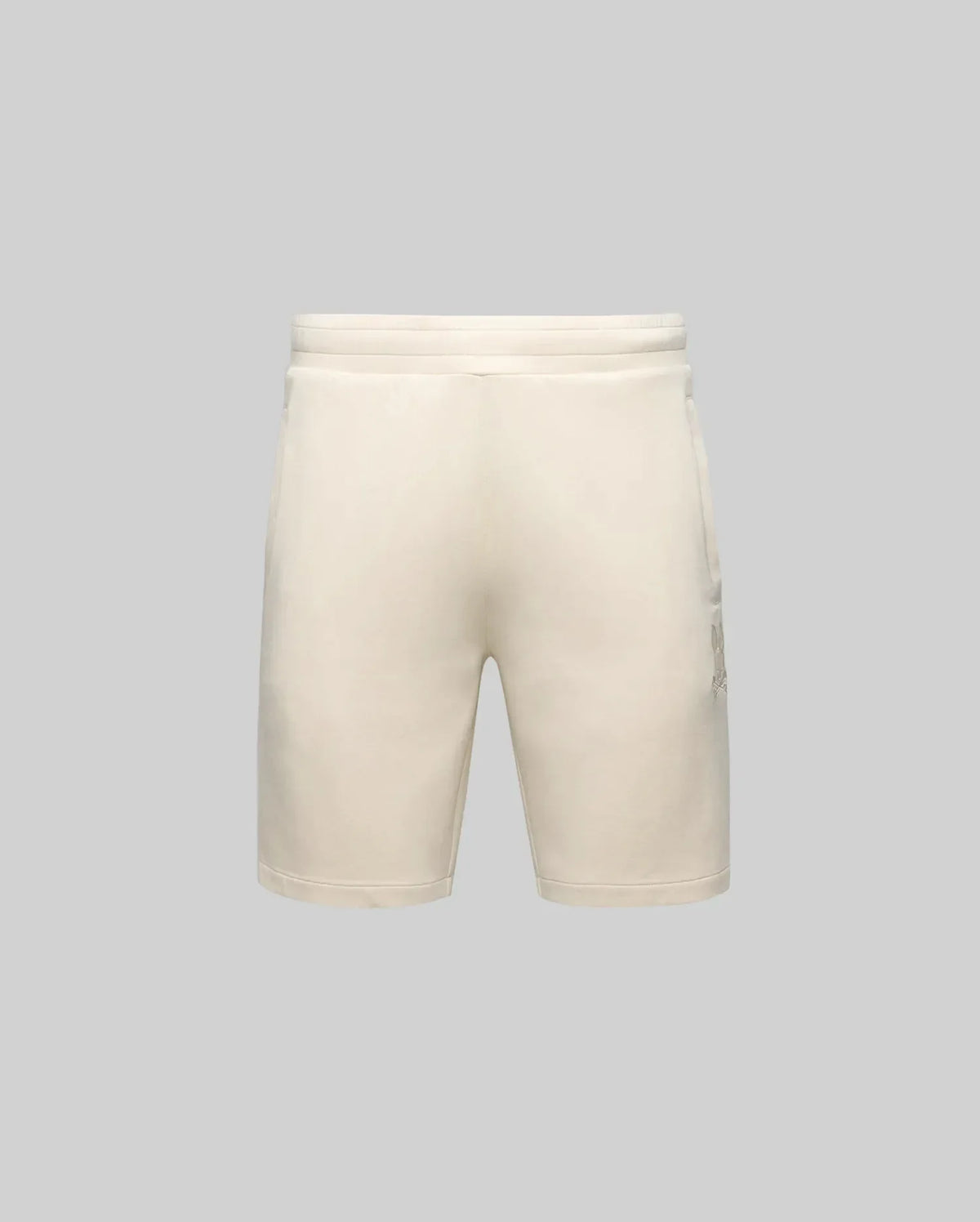 The Psycho Bunny MENS LAZSLO SWEATSHORT (MB0900016) in light beige features an elastic waistband, side pockets, and a stretch modal-cotton-blend for comfort—ideal for casual wear. Shown from the front on a plain gray background.