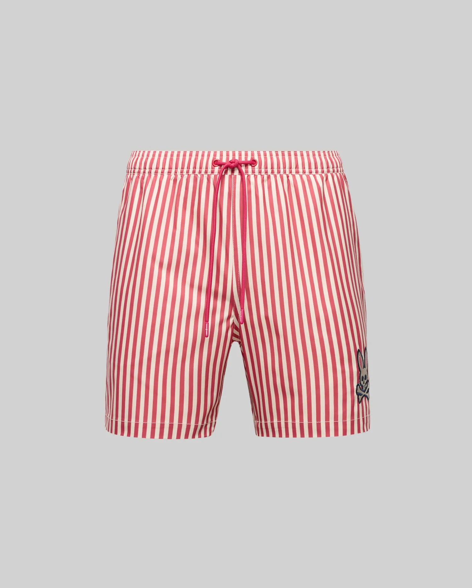 The Psycho Bunny MENS ZANE SWIM TRUNK (MB1000030) features red and white vertical stripes, no-chafe net lining, drawstring waistband, and a black and white bunny logo on the lower left leg, shown on a plain gray background.