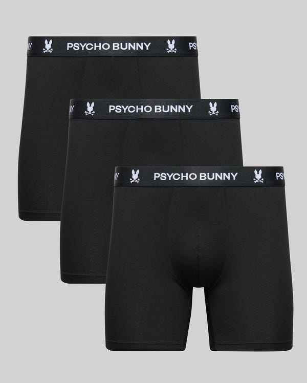 The Psycho Bunny MENS 3 PACK BOXER BRIEF (MO1400006) includes three black pairs made from premium cotton-modal, with "PSYCHO BUNNY" and the bunny logo in white on the waistband, shown on a plain gray background.