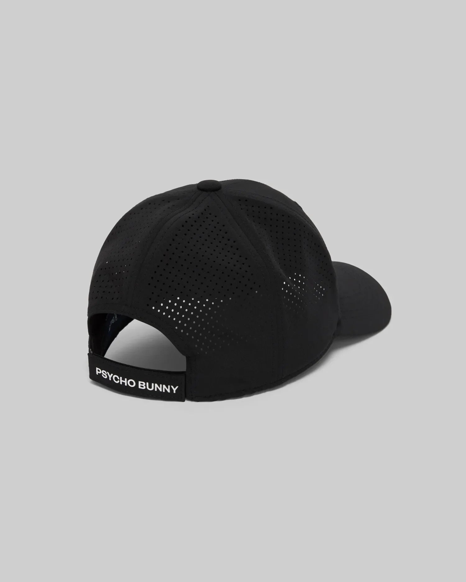 The Psycho Bunny MENS FORREST SPORT CAP (MO1500051) is a black athletic cap with ventilation holes and a sweat-wicking adjustable strap featuring a white "PSYCHO BUNNY" label, shown against a plain gray background.