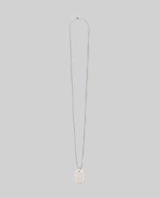 The Psycho Bunny MENS ARMY TAG NECKLACE (MO1700021) features a silver rectangular pendant engraved with a bunny, hanging from a steel cable chain and shown against a plain light gray background.