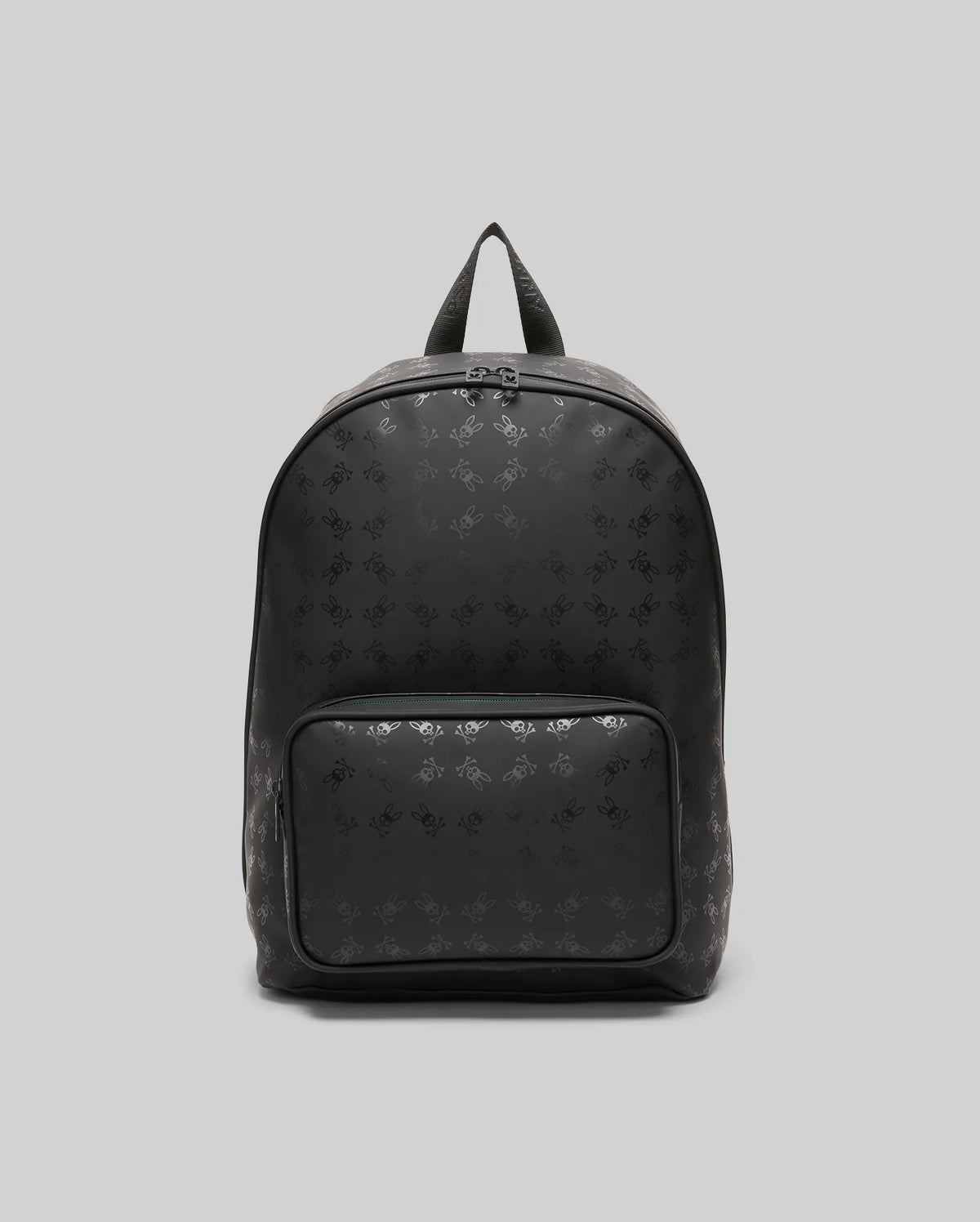 Black Bunny Backpack with an all-over tonal Psycho Bunny skull logo pattern, crafted from smooth material, featuring a front zip pocket and subtle teal zipper detail.