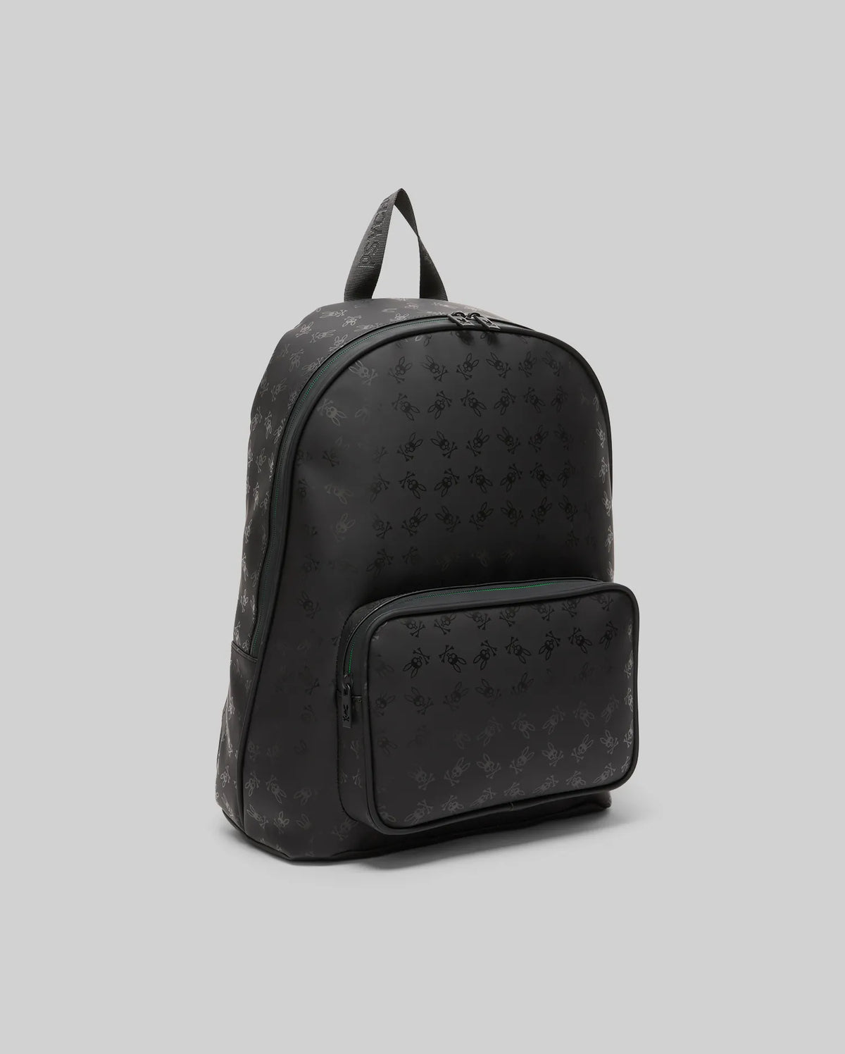 Black Bunny Backpack featuring a subtle all-over tonal Psycho Bunny skull logo print, a zippered main compartment, a front zippered pocket, and green zipper trim.