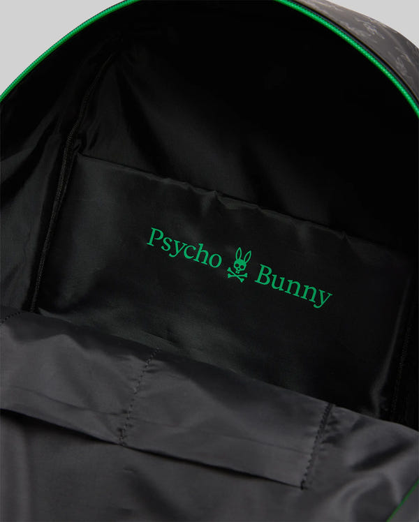 Bunny Backpack in black with a subtle tonal exterior pattern, vibrant green zipper trim, and a smooth black interior lining featuring a prominent green Psycho Bunny skull logo and text.