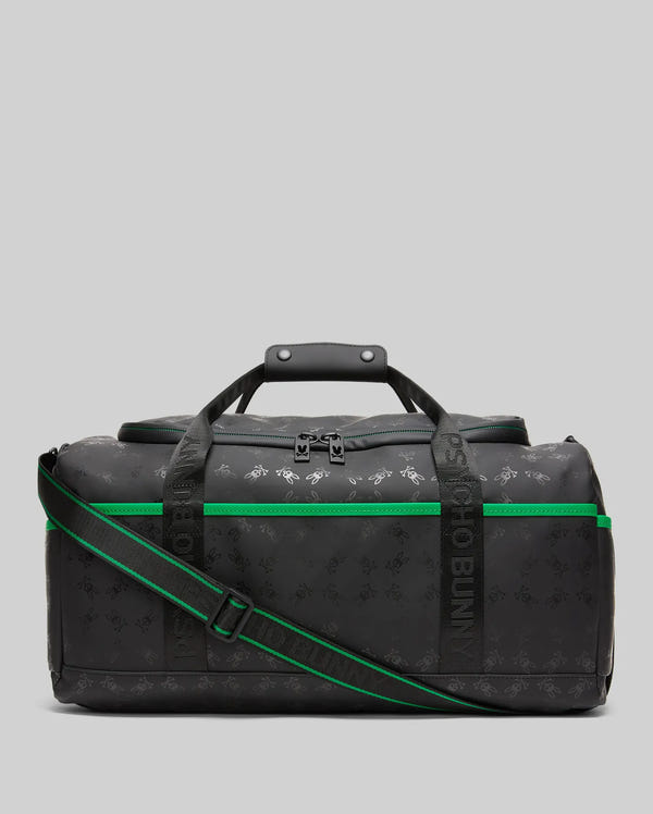 Black Gym Bag with an all-over tonal embossed Psycho Bunny skull logo pattern, vibrant green piping, and a shoulder strap featuring PSYCHO BUNNY branding.