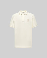 The Psycho Bunny MENS FENLEY PIQUE POLO (MT0100009) is an off-white Pima cotton shirt with short sleeves, a collar, Mother-of-Pearl buttons, and a small bunny logo embroidered on the left chest, shown on a light gray background.