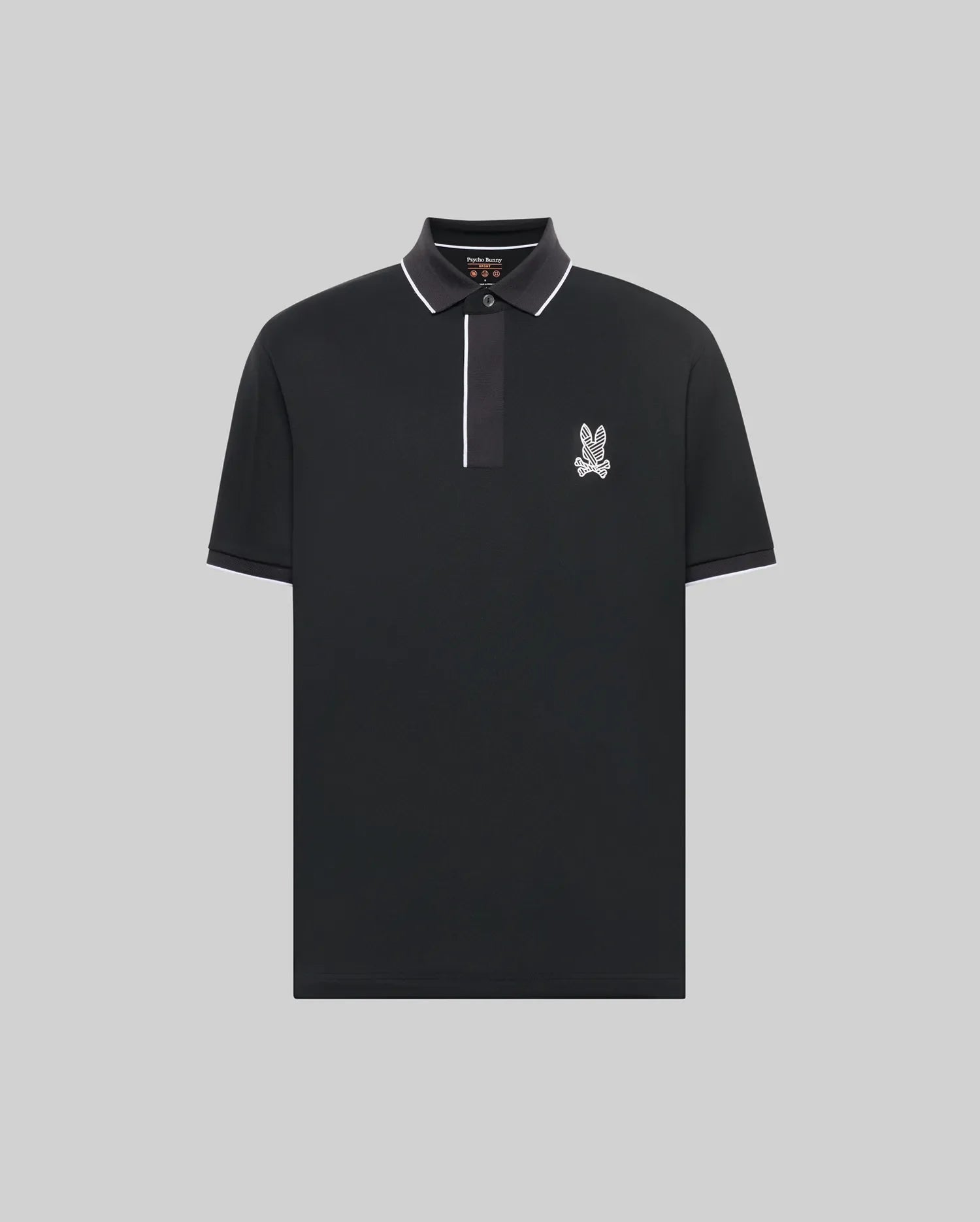The Psycho Bunny MENS JAYDEN SPORT POLO - MT0100111 is a black, short-sleeve athletic fit polo with white trim on the collar and placket, plus a small bunny logo on the left chest. Shown against a plain light gray background.