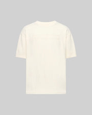 Back view of the Psycho Bunny MENS ZAYN OVERSIZED GRAPHIC TEE (MT0200004) in off-white, relaxed fit and heavyweight jersey, featuring subtle embossed text across the upper back against a light gray background.