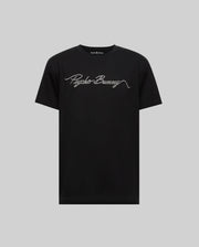 The Psycho Bunny MENS CYRUS WORDMARK GRAPHIC TEE (MT0200018) is a black Pima cotton shirt with "Psycho Bunny" in white cursive on the chest, shown against a plain gray background.