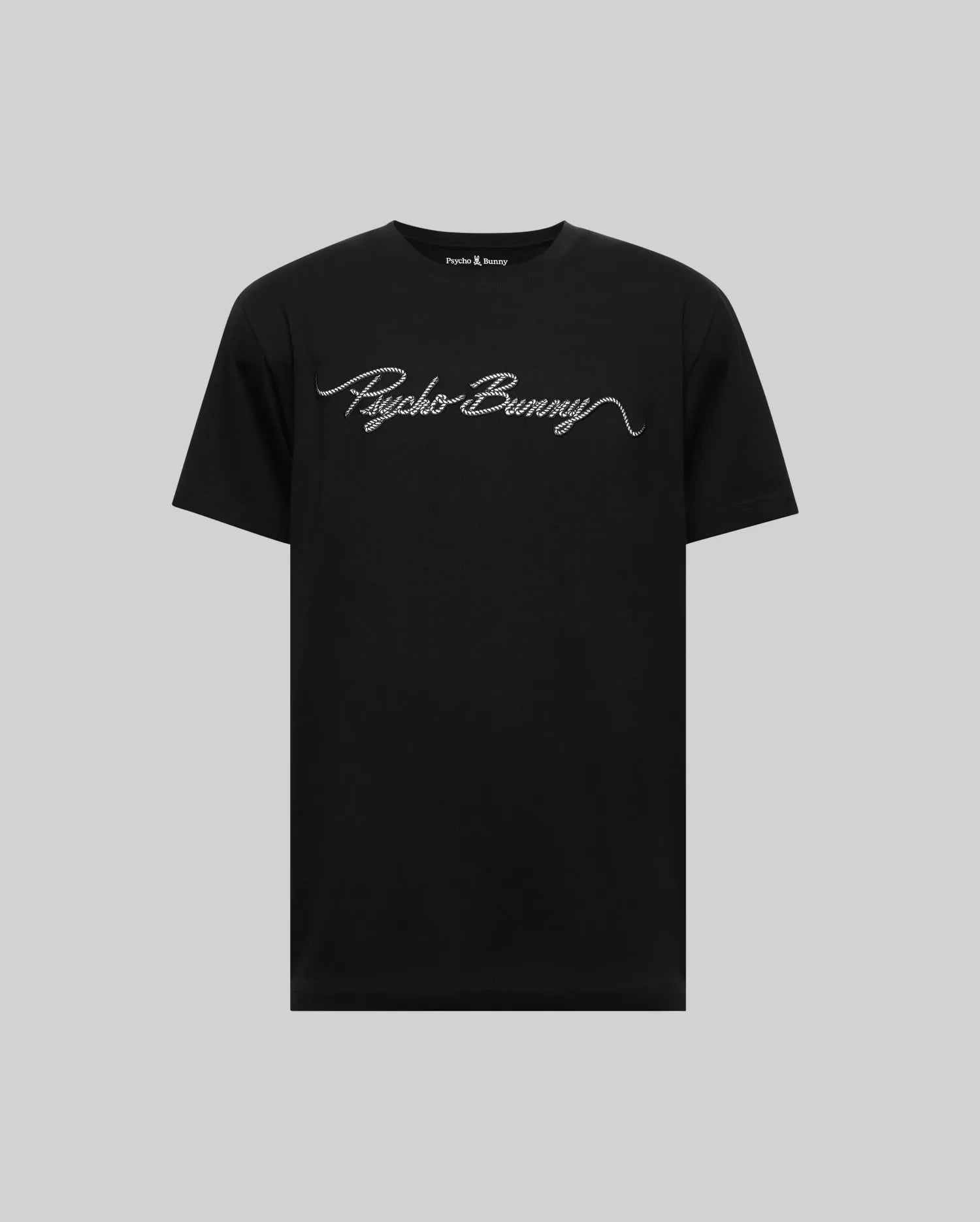 The Psycho Bunny MENS CYRUS WORDMARK GRAPHIC TEE (MT0200018) is a black Pima cotton shirt with "Psycho Bunny" in white cursive on the chest, shown against a plain gray background.