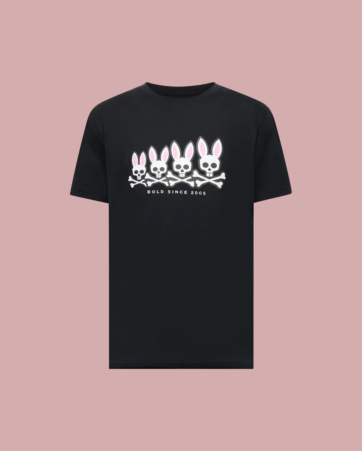 The Psycho Bunny MENS ARCHIVE GRADIANT BUNNY GRAPHIC TEE (MT0200029) showcases four iconic white and pink Bunny skull and crossbones with "BOLD SINCE 2005" text, set against a plain light pink background.