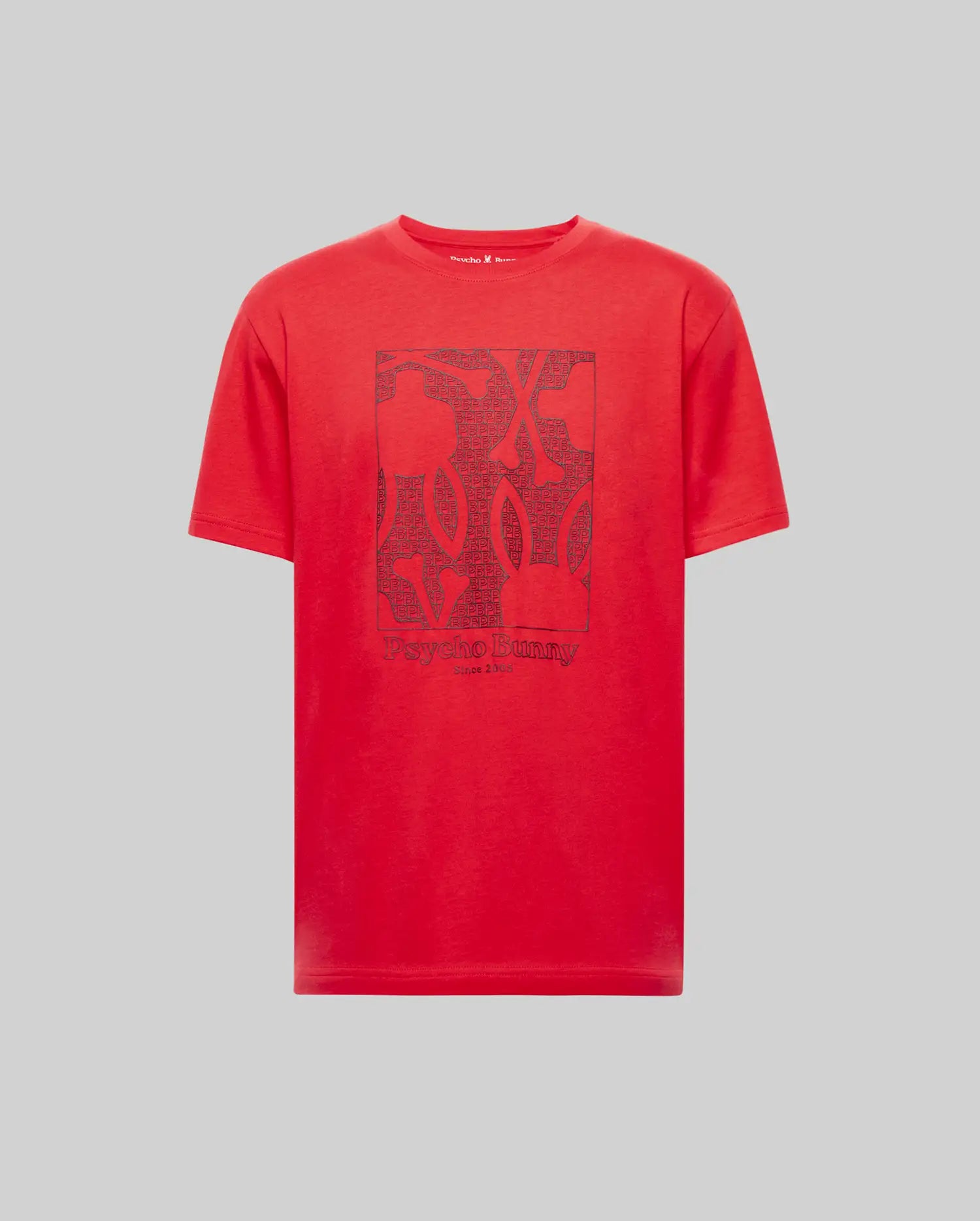 The MENS GLENN GRAPHIC TEE - MT0200034 by Psycho Bunny is a red, 100% Pima cotton short-sleeve tee featuring a rectangular abstract Bunny graphic and "Psycho Bunny" text on the front, shown against a plain gray background.