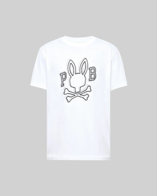 The Psycho Bunny MENS BALES GRAPHIC TEE (MT0200035) is a white Pima cotton shirt with a large bunny graphic, crossed bones, and "P" and "B" on the back for standout year-round style.
