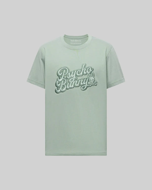The Psycho Bunny MENS ELIAS GRAPHIC TEE - MT0200047 is a light green Pima cotton shirt with "Psycho Bunny" in bold retro script across the chest and a small crossbones bunny graphic below, shown on a plain background.