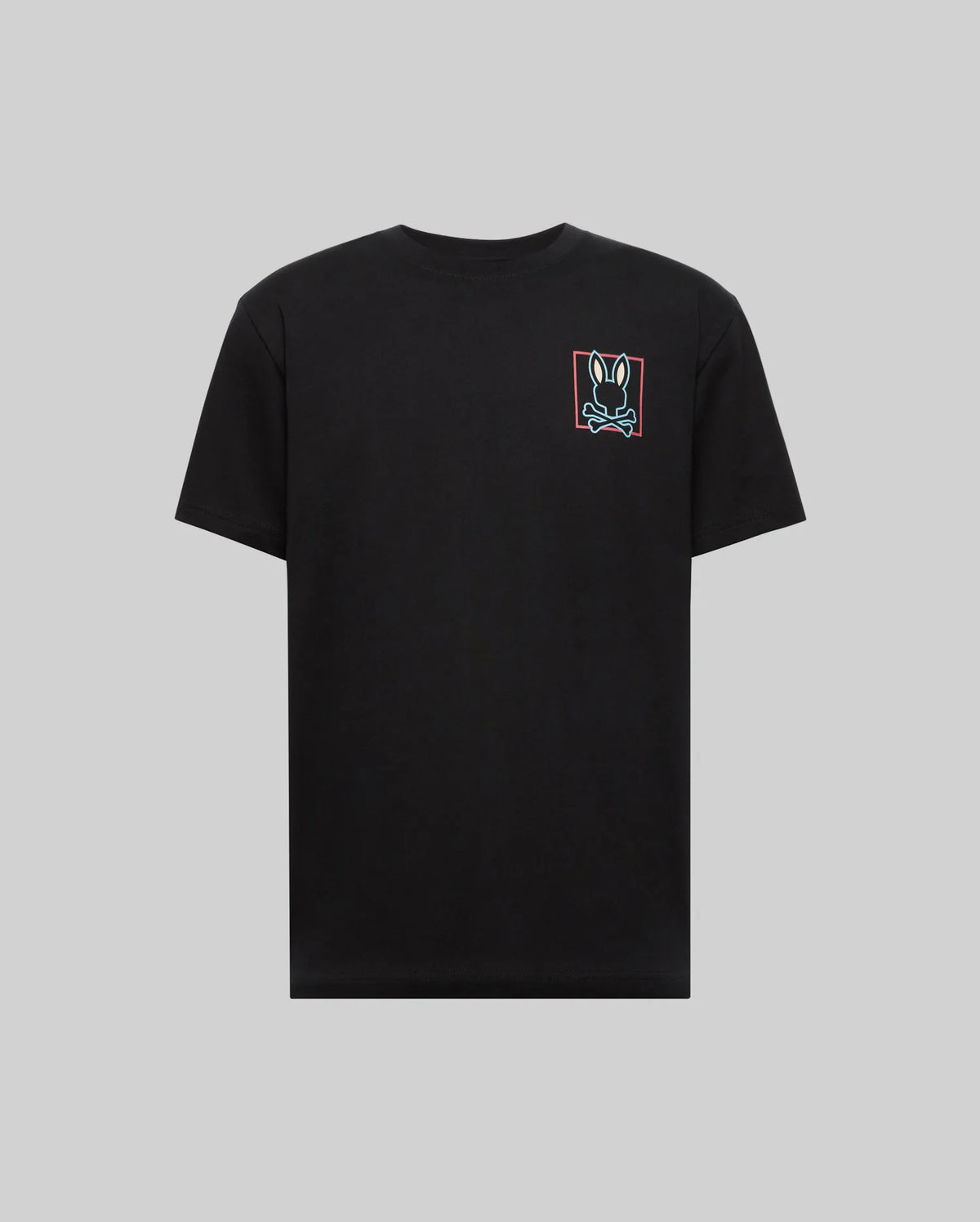 The Psycho Bunny MENS JESSE GRAPHIC TEE (MT0200056) is a plain black Pima cotton shirt with a small, colorful bunny face inside a red rectangle on the left chest, displayed on gray, and printed using eco-friendly water-based inks.