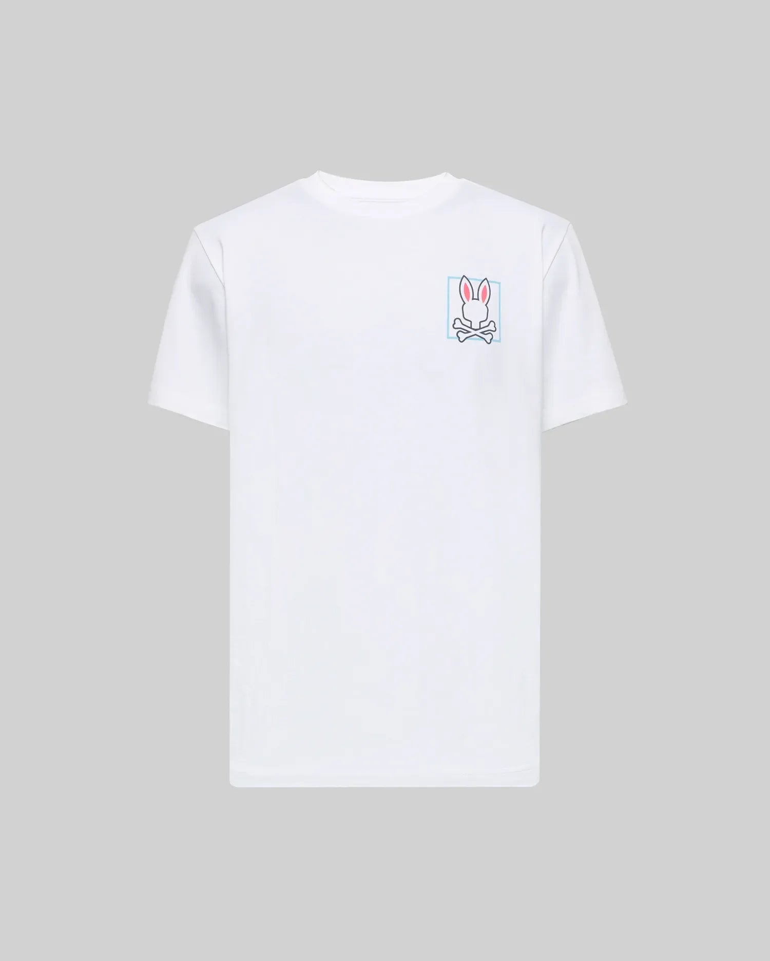 The Psycho Bunny MENS JESSE GRAPHIC TEE (MT0200056) is a plain white Pima cotton shirt with an eco-friendly, water-based pink and white bunny graphic above crossed bones on the left chest, set against a light grey background.