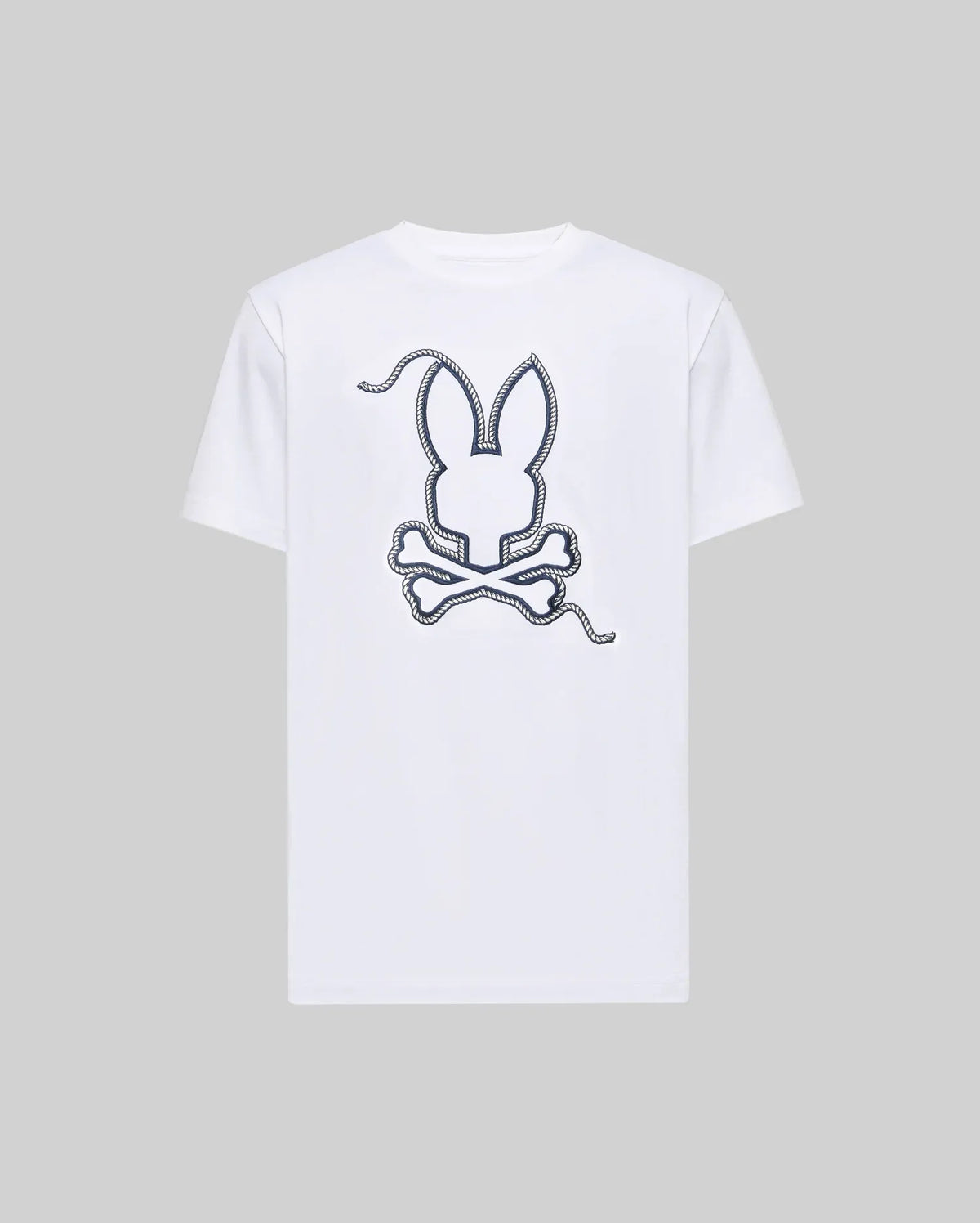 The MENS CYRUS GRAPHIC TEE (MT0200115) by Psycho Bunny features a large outlined bunny head above crossed bones in a playful dashed-line design on soft Pima cotton, set against a light gray background.