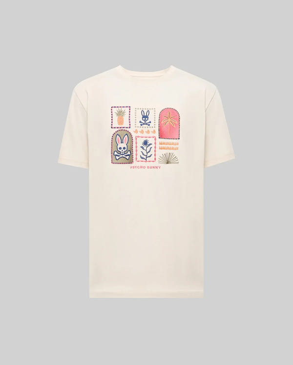 The Psycho Bunny MENS SUNDEW GRAPHIC TEE (MT0200195) is a cream-colored Pima cotton shirt in ocean view style, featuring colorful graphic patches and "Psycho Bunny" printed below the designs.