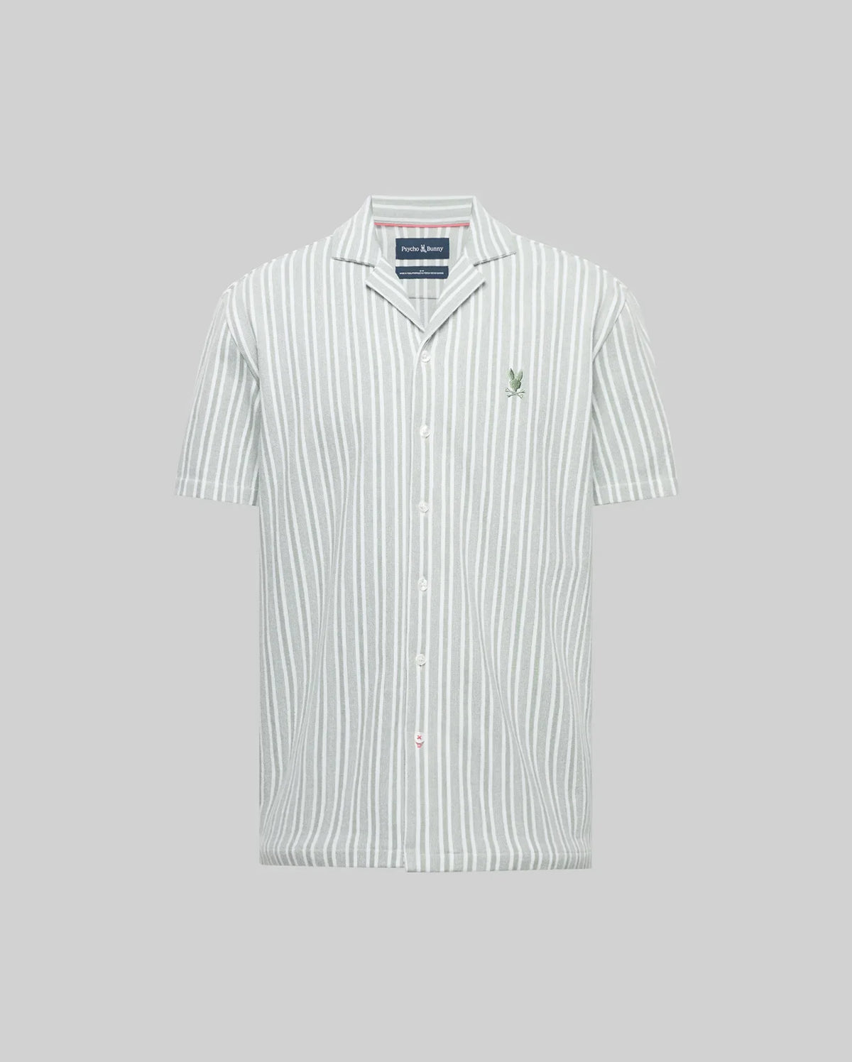 The Psycho Bunny MENS ROBERT TEXTURE STRIPE SHIRT (MT0300005) features short sleeves, a cabana collar, vertical white and light gray stripes, and a small green logo embroidered on the left chest, shown on a plain gray background.