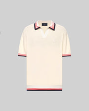 The Psycho Bunny MENS CARTER JOHNNY COLLAR KNIT POLO (MT0400093) is a cream, 100% cotton short-sleeve polo with a deep V-neck Johnny collar and red/navy colorblocked stripes on the collar, sleeves, and hem, shown on a light gray background.