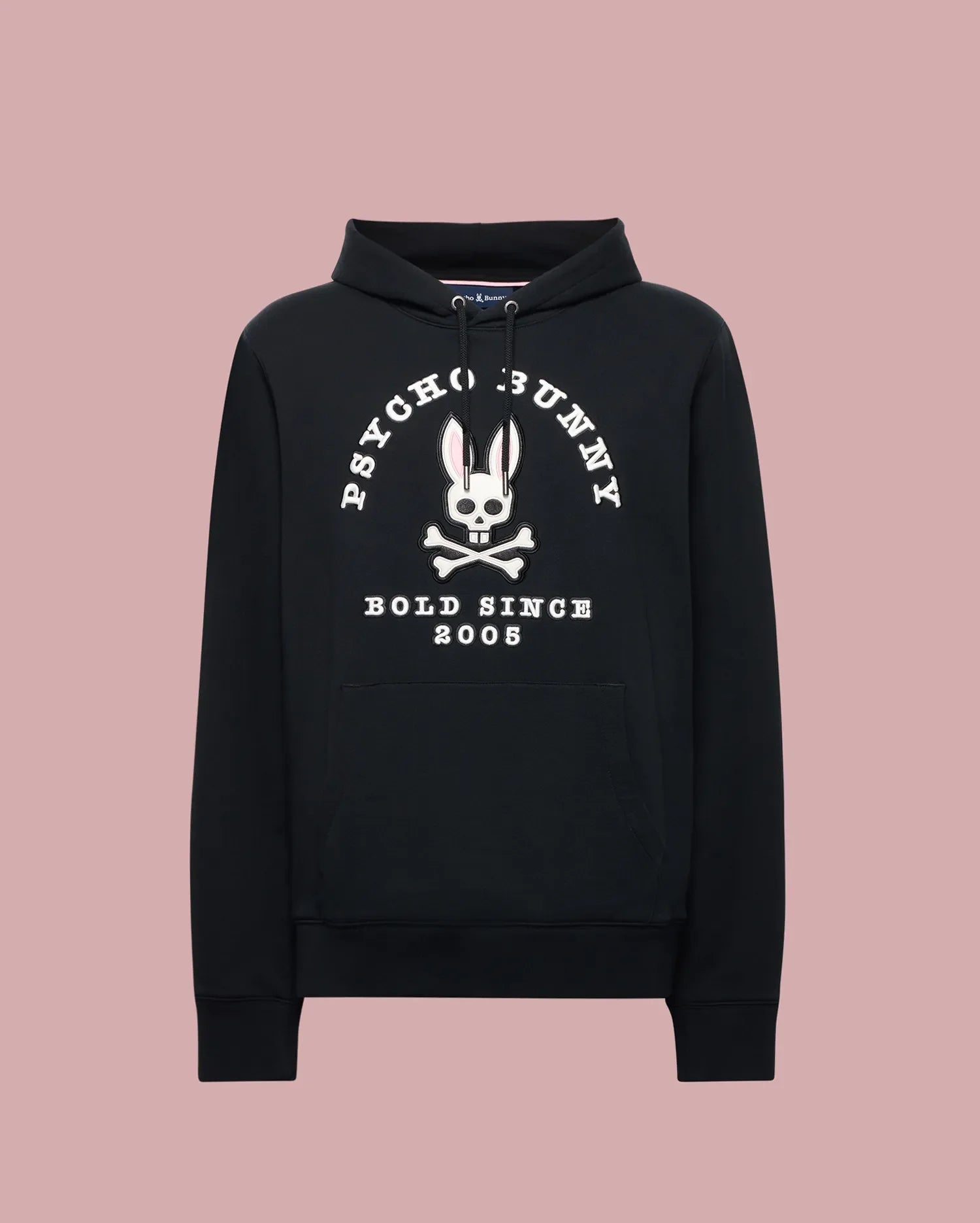 The Psycho Bunny MENS ARCHIVE HOODIE - MT0500009 is a black French terry hoodie with a large white bunny skull and crossbones graphic, “PSYCHO BUNNY” above and “BOLD SINCE 2005” below, plus front pocket and drawstring hood.