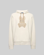 The Psycho Bunny MENS RYDER EMBROIDERED BUNNY PATCH HOODIE (MT0500029) is a cream-colored hoodie with a front pocket, drawstring hood, and large embroidered bunny skull and crossbones patch—ideal for cozy loungewear style.