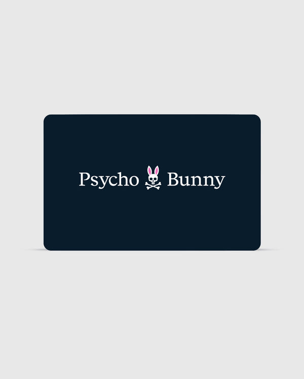 A rectangular card with a dark background features the text "Psycho Bunny Canada" in white. Between the words is a stylized logo of a bunny head with pink ears and a skull and crossbones beneath it. You can check your balance or redeem your Digital Gift Card for exclusive Psycho Bunny apparel using their digital platform.