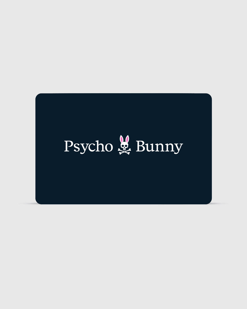 A rectangular card with a dark background features the text "Psycho Bunny Canada" in white. Between the words is a stylized logo of a bunny head with pink ears and a skull and crossbones beneath it. You can check your balance or redeem your Digital Gift Card for exclusive Psycho Bunny apparel using their digital platform.