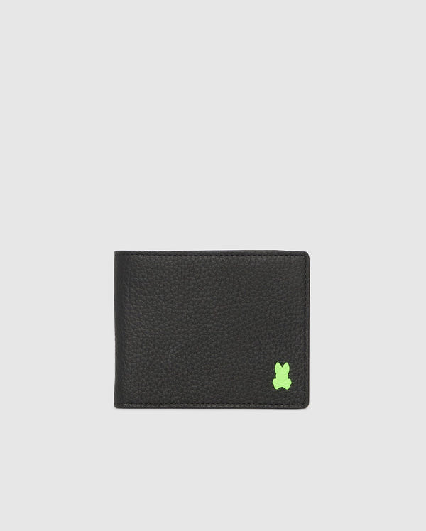 The Psycho Bunny MENS WALLET - B6A403B200 is a black grained leather men’s wallet with card slots and a small green bunny logo in the bottom right corner, shown on a plain light gray background.