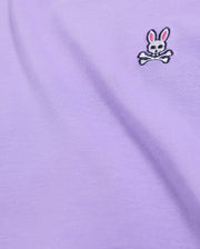 Close-up of the Pima cotton fabric on the Psycho Bunny MENS CLASSIC CREW NECK TEE - B6U014Z1PC, featuring an embroidered Bunny logo with a white skull and crossbones beneath rabbit ears with pink inner ears, located in the upper right area.